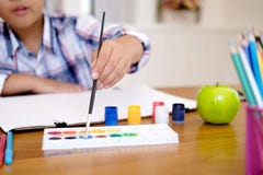 Child boy drawing picture at home stock photos Child boy drawing picture at home stock photos