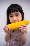 Child Eating a Corn Cob stock photo Child Eating a Corn Cob stock photo