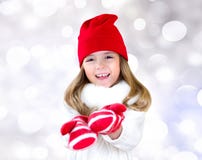 Child Girl Christmas Clothes Stretching Empty Hands. Stock Image Child Girl Christmas Clothes Stretching Empty Hands. Stock Image