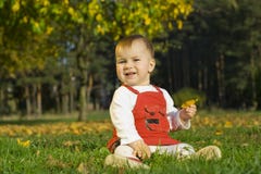 Child in a grass stock photo Child in a grass stock photo