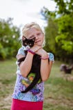 Child Holding Little Cat Pet Stock Photography