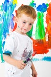 Child Painting With A Great Expression Royalty Free Stock Photos
