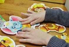 A child pulls puzzles royalty free stock images A child pulls puzzles royalty free stock images