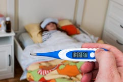 Child`s fever, close up on a digital thermometer royalty free stock photos Child`s fever, close up on a digital thermometer royalty free stock photos