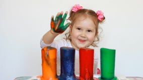 Child and science experiment. Entertainment for children. preschool education. Multicolored drinks. A cute little girl