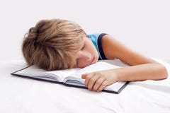 Child Sleeping With Book Royalty Free Stock Images