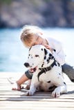 Child With Dog Stock Images