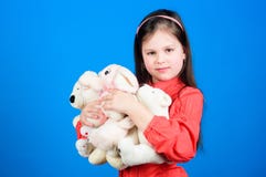 Childhood concept. Small girl smiling face with toys. Happy childhood. Little girl play with soft toy teddy bear. Lot of royalty free stock images Childhood concept. Small girl smiling face with toys. Happy childhood. Little girl play with soft toy teddy bear. Lot of royalty free stock images