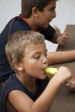 Children Eating Ice Cream Stock Photos