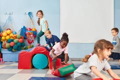 Children play happily in the gym royalty free stock photography Children play happily in the gym royalty free stock photography