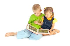 Children Read The Book Royalty Free Stock Photos