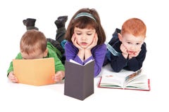 Children reading kids books isolated stock images Children reading kids books isolated stock images