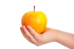 Children S Hand With An Apple. Royalty Free Stock Image