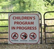 Children`s Program Sign. Children`s Program and learning center in Progress, No Camping, No Hunting, No Shooting stock images Children`s Program Sign. Children`s Program and learning center in Progress, No Camping, No Hunting, No Shooting stock images