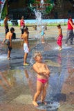 Children Washing Under City Fountains In Gorky Park In Kharkiv Royalty Free Stock Images Children Washing Under City Fountains In Gorky Park In Kharkiv Royalty Free Stock Images