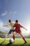 Childrens Are Playing Soccer On Grand Arena Childrens Are Playing Soccer On Grand Arena