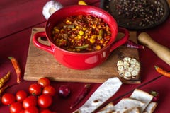 Chile con carne and ingredients for him. Mexican cuisine stock photo Chile con carne and ingredients for him. Mexican cuisine stock photo