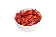 Chili, Chilli red Spicy hot flavor, Dried red chillies in a white cup top view on white background royalty free stock photo Chili, Chilli red Spicy hot flavor, Dried red chillies in a white cup top view on white background royalty free stock photo