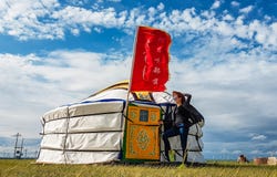 China - Cow girl in front of a yurt in inner mongolia royalty free stock images China - Cow girl in front of a yurt in inner mongolia royalty free stock images