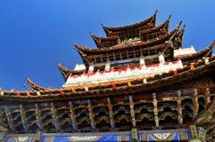 China Temples On Sky And A Monk Stock Photo