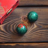 Chinese balls on a wooden background stock photos Chinese balls on a wooden background stock photos