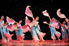 Chinese Folk Dance- Many People Fan Dance Royalty Free Stock Photo