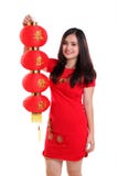 Chinese girl raise the red lantern isolated stock image Chinese girl raise the red lantern isolated stock image