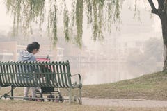 Chinese mom take care baby in baby carseat royalty free stock photos Chinese mom take care baby in baby carseat royalty free stock photos