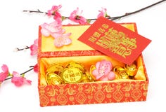 Chinese new year ornaments and red packets. Chinese new year gift box, red packets and ornaments on white background Chinese new year ornaments and red packets. Chinese new year gift box, red packets and ornaments on white background
