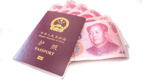 Chinese passport with some 100 Chinese yuan cash. royalty free stock image Chinese passport with some 100 Chinese yuan cash. royalty free stock image