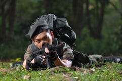 Chinese Sniper taking aim at enemy royalty free stock photo Chinese Sniper taking aim at enemy royalty free stock photo
