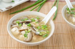 Chinese Spicy Soup With Egg, Shiitake Mushrooms, Tofu And Green Stock Photos