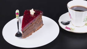 Chocolate cake on white plate stock image Chocolate cake on white plate stock image