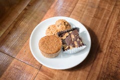 Chocolate chips cookies on a white plateChocolate chips cookies and brownie on a white plate royalty free stock images Chocolate chips cookies on a white plateChocolate chips cookies and brownie on a white plate royalty free stock images