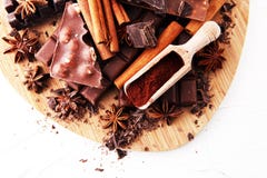 Chocolate concept with assorted chocolate, powder and spices stock image Chocolate concept with assorted chocolate, powder and spices stock image