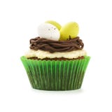 Chocolate Easter cupcake with nest and eggs. Isolated on white royalty free stock photos Chocolate Easter cupcake with nest and eggs. Isolated on white royalty free stock photos