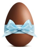 Chocolate Easter Egg with blue ribbon Bow on white back stock photo Chocolate Easter Egg with blue ribbon Bow on white back stock photo
