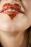 Chocolate Heart On Lips Stock Image