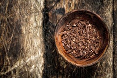 Chokladshavings i en bunke fotografering för bildbyråer Chokladshavings i en bunke fotografering för bildbyråer
