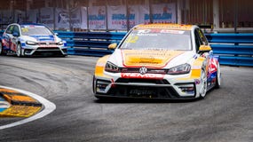 Volkswagen car racing on racetrack in Bangsaen Grand Prix 2018 near Bangsaen beach in Thailand royalty free stock photography Volkswagen car racing on racetrack in Bangsaen Grand Prix 2018 near Bangsaen beach in Thailand royalty free stock photography