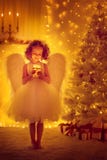 Christmas Angel Child With Wings Hold Lighting Candle, Xmas Tree Royalty Free Stock Photo Christmas Angel Child With Wings Hold Lighting Candle, Xmas Tree Royalty Free Stock Photo
