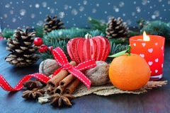 Christmas background with fruits, spices, fir and candle stock image Christmas background with fruits, spices, fir and candle stock image
