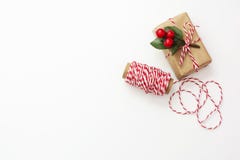 Christmas Background. Gift Boxes Wraped In Craft Paper Over White Background. Wraping Gift Boxes. Top View. Copy Space Royalty Free Stock Photo