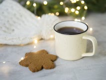 Christmas background with Gingerbread cookies, cup of tea. Cozy evening, mug of drink, Christmas decorations, lights garlands, royalty free stock images Christmas background with Gingerbread cookies, cup of tea. Cozy evening, mug of drink, Christmas decorations, lights garlands, royalty free stock images
