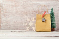 Christmas background with homemade gift bag and rustic decorations stock photo Christmas background with homemade gift bag and rustic decorations stock photo