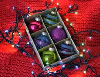 Christmas balls on red knitted background royalty free stock photos Christmas balls on red knitted background royalty free stock photos