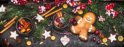 Christmas Banner With Gingerbread Man , Mug Of Mulled Wine Or Punch, Fir Branches , Holiday Cookies And Festive Decoration Royalty Free Stock Photos Christmas Banner With Gingerbread Man , Mug Of Mulled Wine Or Punch, Fir Branches , Holiday Cookies And Festive Decoration Royalty Free Stock Photos