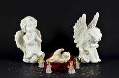 Christmas, birth on an angel from red rose, isolated on black Royalty Free Stock Photography Christmas, birth on an angel from red rose, isolated on black Royalty Free Stock Photography