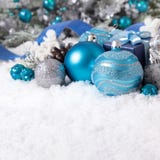 Christmas border with baubles, decorations and gifts on the snow royalty free stock photo Christmas border with baubles, decorations and gifts on the snow royalty free stock photo