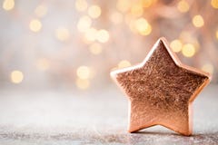 Christmas Bronze Decoration. Holiday Decorations Bronze On Bokeh Background. Royalty Free Stock Images